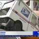 Illustration for article titled A Mail Truck Somehow Ended Up On Top Of The Car That Crashed Into It